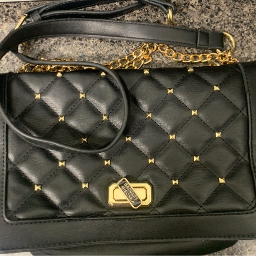 Black Quilted Leather Bag with Gold Accents